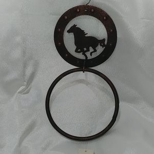 Metal towel rack Horse ring in copper finish.